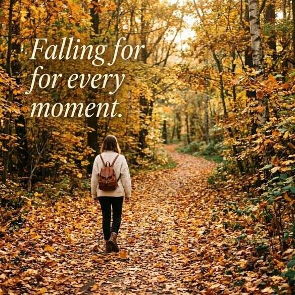 Aesthetic autumn pathway covered with golden fallen leaves under soft sunlight, cozy fall atmosphere, featuring the caption “Falling for every moment.”